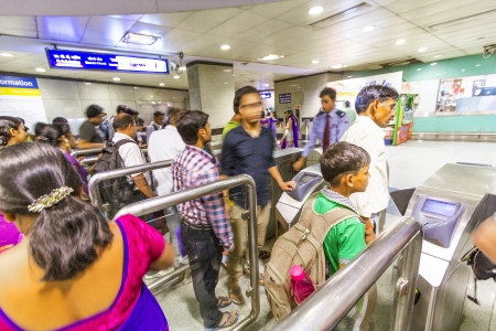 DELHI, INDIA - OCTOBER 15: passengers alighting metro train on October 15, 2012 in Delhi, India. Nealy 1 million passengers use the metro daily.のeditorial素材
