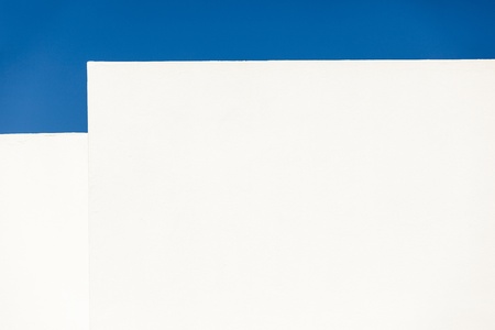 white wall under blue skyの写真素材