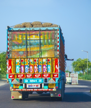 JODHPUR, INDIA - 23 OCTOBER: painted back of a truck in Jodhpur on October 23, 2012. Most trucks are painted with religious motives and or hints like blow horn please.のeditorial素材