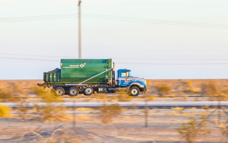 GILA BEND, USA - JULY 11: truck on interstate 8 in early morning at July 11, 2012 in Gila Bend, USA. I-8 was part of the original 1957 plan of Interstates, following US 80 from San Diego to Gila Bend.のeditorial素材