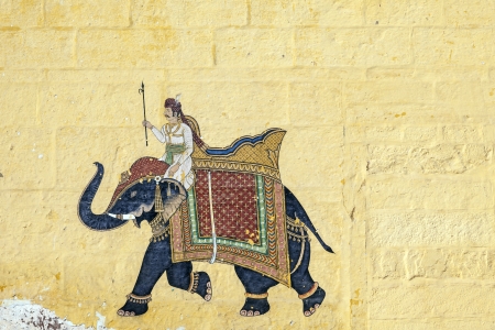 colorful indian mural in the fort at Jodhpur showing a royal procession, including elephant  from the Rajput eraのeditorial素材