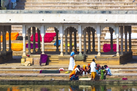 PUSHKAR, INDIA - OCT 20: people at rituell washing  in the holy lake on Oct 20,2012 in Pushkar,...
