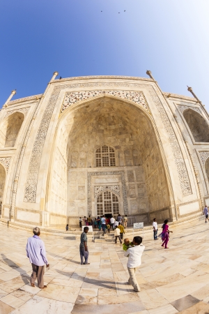 AGRA, INDIA - OCT 18: people visit Taj Mahal, Agra, India on Oct 18, 2012. The Taj Mahal is a mausoleum located in Agra and one of the most recognizable structures in the world.のeditorial素材