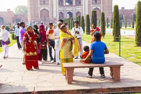 AGRA, INDIA - OCT 18: people visit Taj Mahal, Agra, India on Oct 18, 2012. The Taj Mahal is a mausoleum located in Agra and one of the most recognizable structures in the world.のeditorial素材