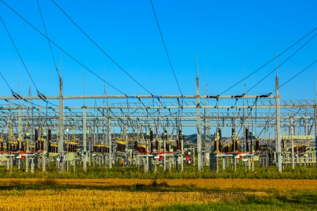 electrical power plant in beautiful colorful meadowの写真素材