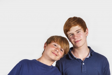 portrait of cute handsome brothers having fun togetherの写真素材