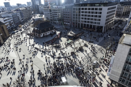FRANKFURT, GERMANY- March 2: people walk along the Zeil in Midday on March 2,2013 in Frankfurt, Germany. Since the 19th century it is of the most famous and busiest shopping streets in Germany.のeditorial素材