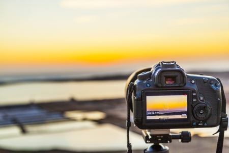 JANUBIO, LANZAROTE - MARCH 30: tripot shot of a romantic sunset on March 30,2013 in Janubio, Lanzarote. With digital SLRs the resolution is much better than with analog film material.のeditorial素材