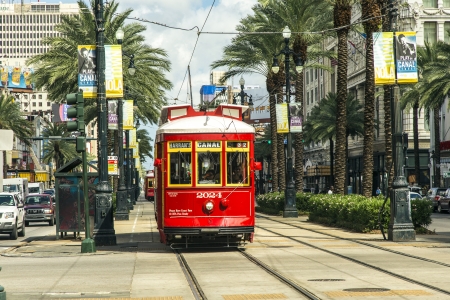 red trolley streetcar on rail in New Orleans French Quarterのeditorial素材