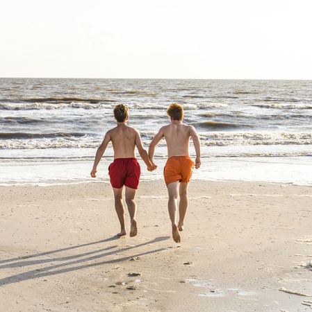 teenager enjoys jogging along the beautiful beach