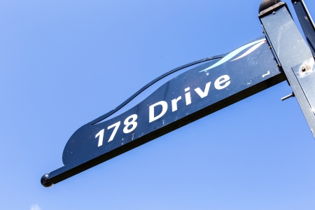 typical street sign in sunny islands under blue skyのeditorial素材