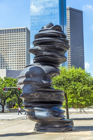 HOUSTON, USA - JULY 11  sculpture  in Minds  from Tony Cragg is placed at Gagby Street on July 11, 2013 in Houston, USA  He created these large cast bronze pieces of art over a skeleton comprised of stainless steel  It must have been quite an undertaking のeditorial素材