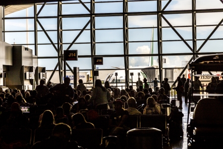 MIAMI, USA - AUGUST 7: Miami internationa Airport on August 7, 2013 in Miami, USA. People wait for boarding inside the new terminal for international flights. The main terminal dates back to 1959.のeditorial素材