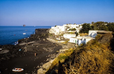 GINOSTRA, ITALY - JULY 5  people relax at the empty volcanic beach on July 5, 1999 in Ginostra, Italy  Ginostra is a small village on the volcanic island of stromboli and only accessible by boat のeditorial素材