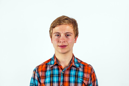 portrait of smiling cute boy in studio
