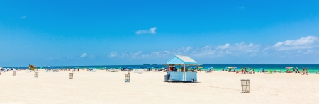 Miami, USA - July 27, 2010: People enjoy swimming in South Beach  in Miami Beach, USA. In 1870, Henry and Charles Lum purchased the area and his daughter Taylor named it South Beach.のeditorial素材