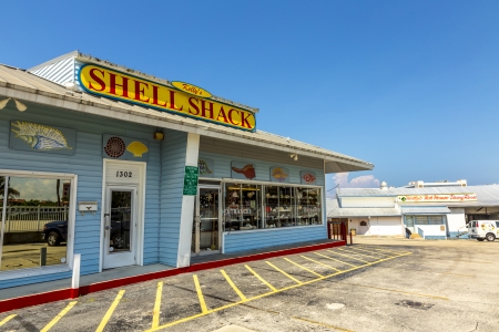 NAPLES, USA - JULY 27: panoramic view with old dock buildings at Naples Pier on July 27, 2013 in Naples, USA. In 1887, the Naples Town was founded by Kentucky business leaders led by Senator, John S. Williams.のeditorial素材