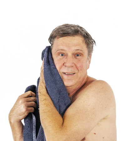 Man toweling hair after showerの写真素材