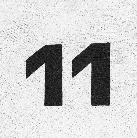 House number 11painted at the wall