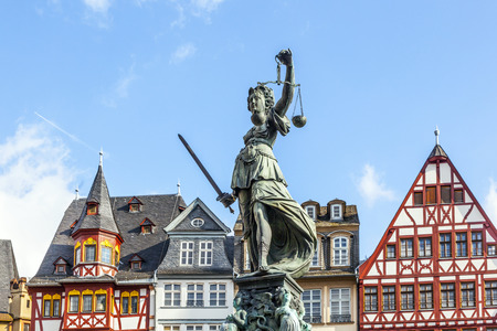 Statue of Lady Justice in front of the Romer in Frankfurt - Germanyの写真素材