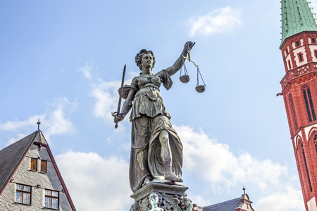 Statue of Lady Justice in front of the Romer in Frankfurt - Germanyの写真素材