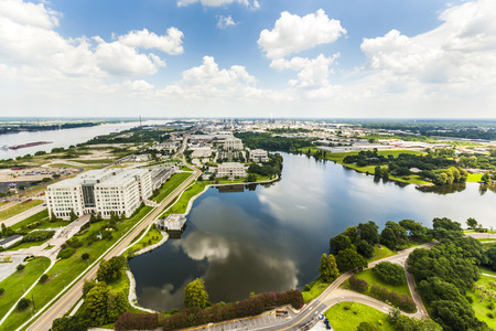 aerial of baton Rouge with Missisippi river and oil refineries at the horizonの写真素材