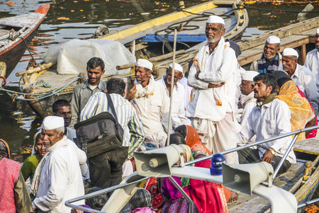 VARANASI, INDIA - DEC 11: people cross the river Ganges on a ferry on December 11, 2011 in Varanasi, India. Fwerry accidents costs more than 3000 lives in india yearly.のeditorial素材