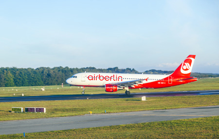 HAMBURG, GERMANY - SEP 29: An Air Berlin Airbus A319 lands on September 29, 2012 in Hamburg, Germany. Air Berlin is Germany's second largest airline with 35.3 million passengers in 2011.のeditorial素材