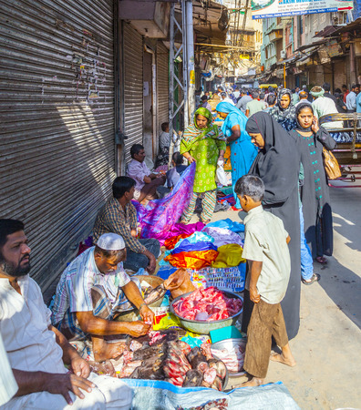 DELHI, INDIA - OCT 16: people sell goods at the street at Chawri Bazar on Oct 16, 2012 in Delhi, India. Established in 1840 it was the first wholesale market of Old Delhi.のeditorial素材