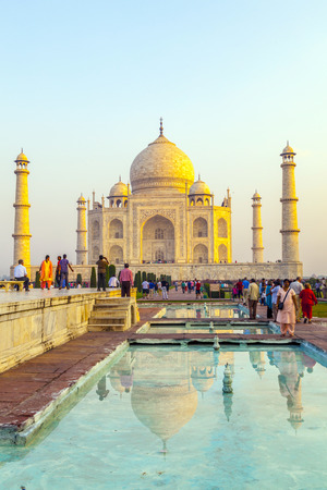 AGRA, INDIA - OCT 18: The people visit Taj Mahal, Agra, India on Oct 18, 2012. The Taj Mahal is a mausoleum located in Agra, India and is one of the most recognizable structures in the worldのeditorial素材