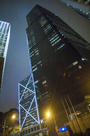VICTORIA, HONG KONG - JAn 8: facade of illuminated skyscraper by night on Jan 8, 2010 in Victoria,...