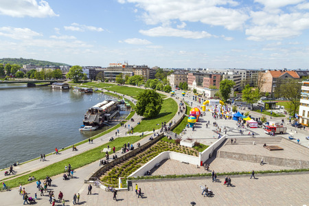 KRAKOW, POLAND - MAY 4: people enjoy entertainment at the Vistula River in the historic city center, May 4, 2013 in Krakow, Poland. Vistula is the longest river in Poland, at 1,047 kilometres in length.のeditorial素材