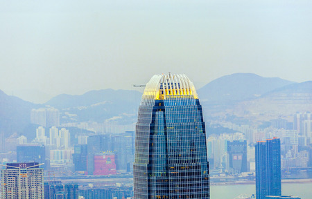 TORIA, HONGKONG - JANUARY 8, 2010: The International Finance Centre with city skyline in Victoria, Hong Kong. It is the 2nd in Hong Kong, 4th in China and 8th tallest in the world.のeditorial素材