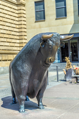 FRANKFURT, GERMANY - JUNE 3, 2014: The Bull and Bear Statues at the Frankfurt Stock Exchange in Frankfurt, Germany. Frankfurt Exchange is the 12th largest exchange by market capitalization.のeditorial素材