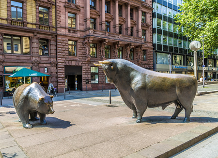 FRANKFURT, GERMANY - JUNE 3, 2014: The Bull and Bear Statues at the Frankfurt Stock Exchange in Frankfurt, Germany. Frankfurt Exchange is the 12th largest exchange by market capitalization.のeditorial素材