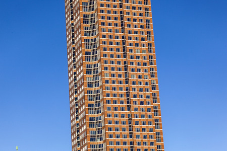 FRANKFURT, GERMANY - OCTOBER 10, 2010: Messeturm with clear blue sky in Frankfurt, Germany. The skyscraper was the highest building in Europe from 1991 until 1997 with 257 meters.のeditorial素材