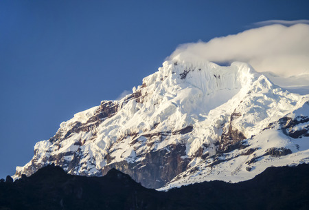 snow capped Antisana Vocano in Ecuador in morning lightの写真素材