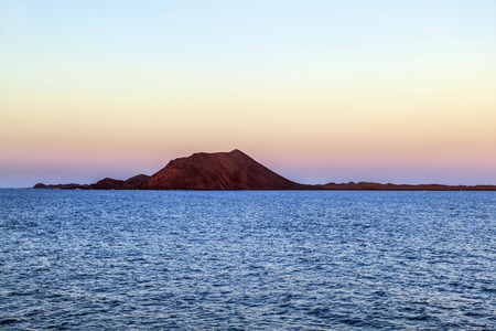 sunset in Fuerteventura, Canary islands seen from the oceanの写真素材