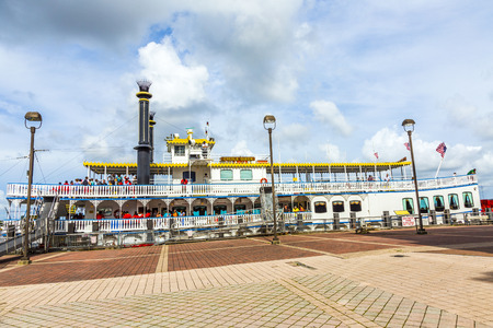 NEW ORLEANS - JULY 16, 2013: people at the creole Queen steam boat in New Orleans, USA. Constructed in Moss Point, Mississippi, the Creole Queen took her maiden voyage on October 1, 1983.のeditorial素材
