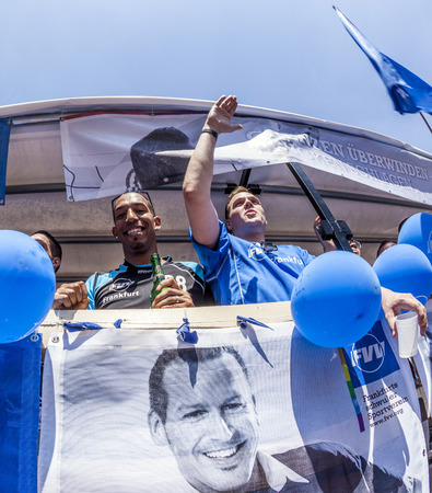 FRANKFURT, GERMANY - JULY 19, 2014: Christopher Street Day in Frankfurt, Germany. Crowd of people, gays, lesbian and bisexuals, participate in the parade celebrating the Christopher street day.のeditorial素材