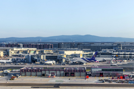 FRANKFURT, GERMANY - JULY 24, 2014: Terminal 1 in sunrise in Frankfurt, Germany. It is one of the busiest airport in Europe with 59 million passengers in 2011.のeditorial素材