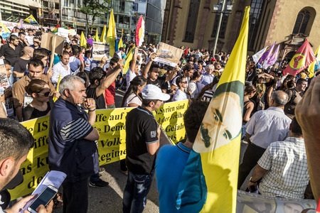FRANKFURT, GERMANY - AUGUST 9, 2014: people demonstrate against murder and violation of kurdish people and killing by IS soldiers in Frankfurt, Germany.のeditorial素材