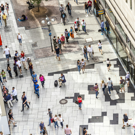 FRANKFURT, GERMANY- AUGUST 9, 2014: People walking along the Zeil street in Frankfurt, Germany. The place is one of the most famous and busiest shopping streets in Germany.のeditorial素材