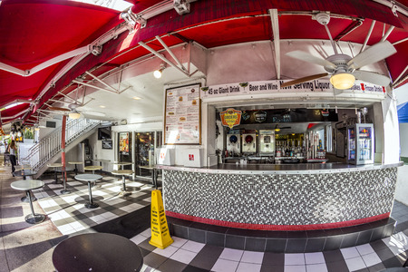 MIAMI, USA - AUG 20, 2014: Johnny Rockets at ocean drive 728 in Miami, USA. It is a famous Scarface film location for b.e. Fun with a chainsaw.のeditorial素材