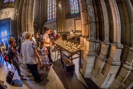 COLOGNE, GERMANY- SEP 7, 2014: church service held in the cathedral in Cologne, Germany. The dome is Germanys most visited landmark visited by 20.000 people a day.のeditorial素材
