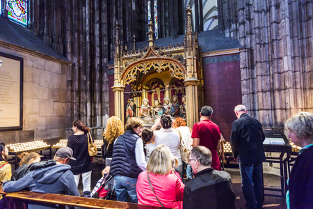 COLOGNE, GERMANY- SEP 7, 2014: church service held in the cathedral in Cologne, Germany. The dome is Germanys most visited landmark visited by 20.000 people a day.のeditorial素材