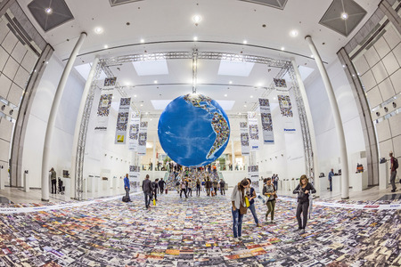PHOTOKINA, COLOGNE - SEPTEMBER 19, 2014: people visit Photokina - World of Imaging, Top Event for the Trade and User, photo globe,  in Cologne, Germany.のeditorial素材