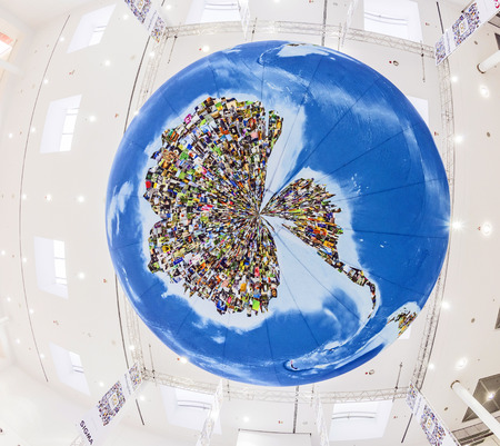 PHOTOKINA, COLOGNE - SEPTEMBER 19, 2014: people visit Photokina - World of Imaging, Top Event for the Trade and User, photo globe,  in Cologne, Germany.のeditorial素材