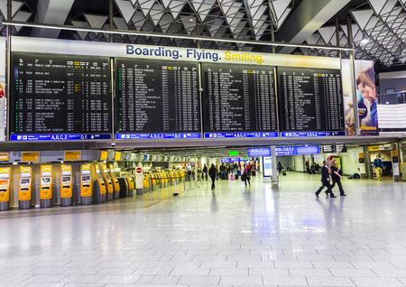 FRANKFURT, GERMANY - SEP 22, 2014: people at the Airport in the evening in Frankfurt, Germany. In 2012, Frankfurt handled 57.5 million passengers.のeditorial素材