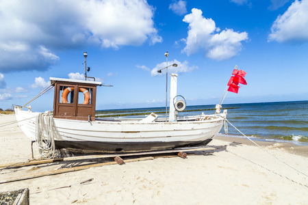 fishermans boat at the beach of the baltic sea